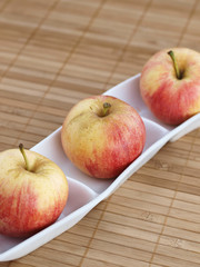 Three apples in a bowl 02