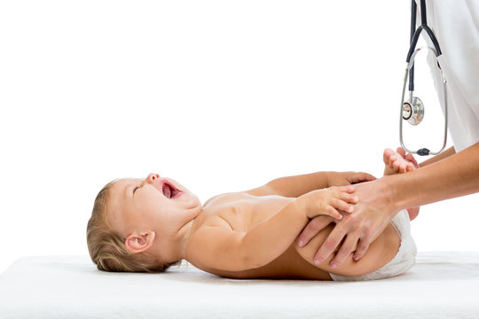 doctor massaging baby girl