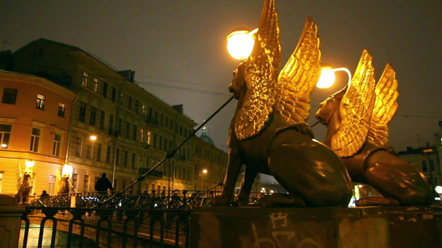 Griffins on Bank Bridge in Saint Petersburg at night