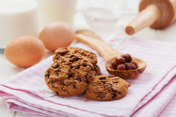 Christmas chocolate and nut cookies with glass of milk