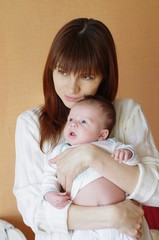 Mother presses to itself the small child (1 month)