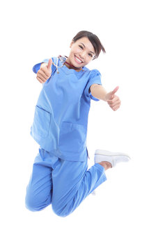 Woman Doctor Jumping With Thumb Up