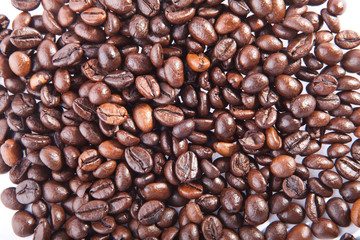 Heap of coffee beans. Isolated on white background