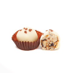 white chocolate candy with dried fruits and candied inside.