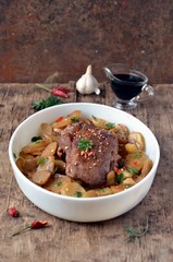 Meat baked with potatoes