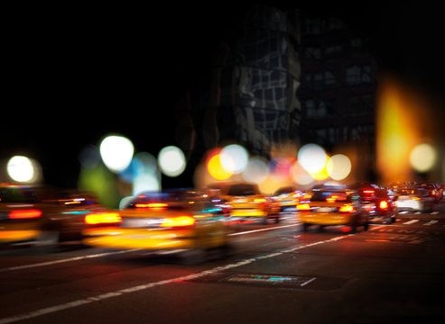 Fototapeta Blurred yellow cabs