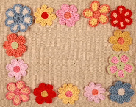 Fototapeta frame of knitted flowers