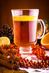 Mulled wine with cinnamon sticks and christmas anise stars