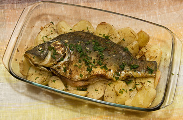 baked fish and potatoes