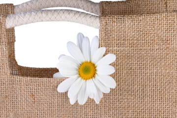 eco-friendly jute bag with white flower