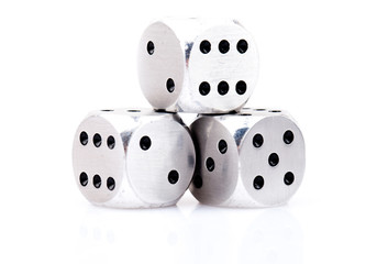 metal dice isolated on white