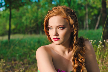 Fototapeta premium young woman in the forest
