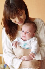 Mother presses to itself the small child (1 month)