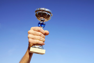 Holding up the cup