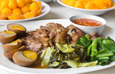 Stewed pork leg with five spices, served with eggs and pickle