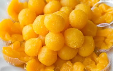 Gold egg yolks drops and Pinched gold egg yolks in flower shape