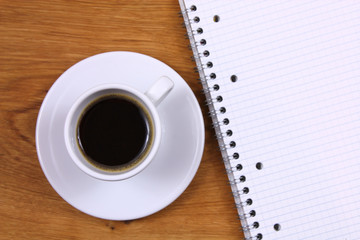 Obraz na płótnie Canvas Coffee and notebook