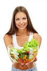 beautiful young woman with salad, isolated on white