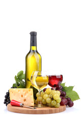 bottle and glasses of wine, assortment of grapes and cheese