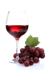 glass of wine and grapes, isolated on white
