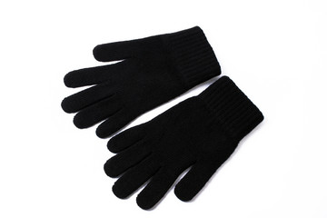 Black gloves on the white background