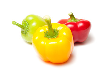 Red, green and yellow peppers