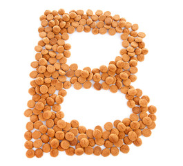 Ginger nuts, pepernoten, in the shape of letter B