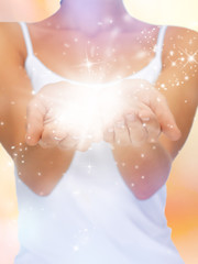 magic twinkles on female hands
