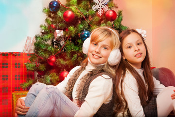 Two sisters celebrating Christmas