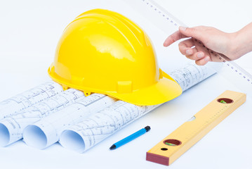 construction helmet and architect tools
