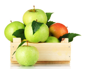 sweet apples in wooden crate, isolated on white