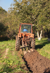 farmer plowing