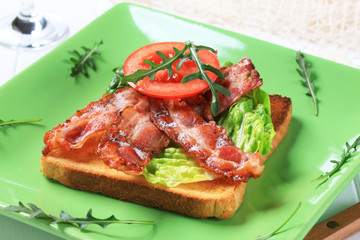 Toast with crispy bacon strips