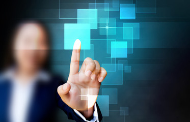 hand of business women pushing a button on a touch screen interf