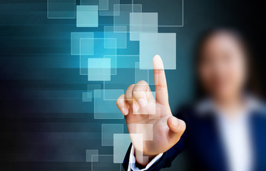 hand of business women pushing a button on a touch screen interf