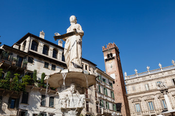 Fototapeta na wymiar Fountain and Statue of Madonna on Piazza delle Erbe in Verona, V