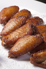 Chicken wings barbequed.