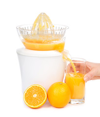 orange juice squeezed with juicer into glass