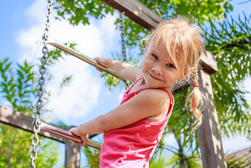 the girl on the playground © altanaka