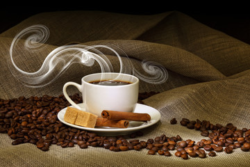 Coffee beans and white cup