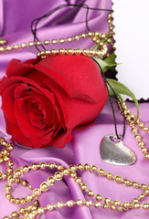 Heart pendant with red rose