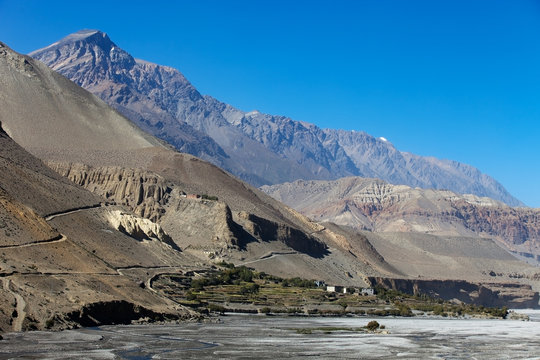 small village near the river in desert mountain