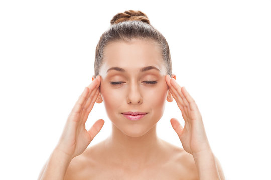 Woman Touching Her Temples