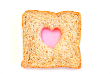 Wheat Bread Slice with heart Isolated on White