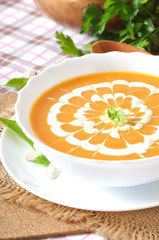Cream of pumpkin soup with sour cream sauce 