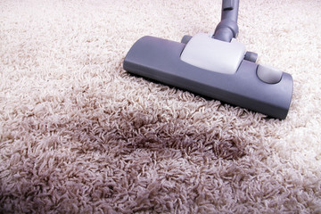 vacuuming very dirty carpet