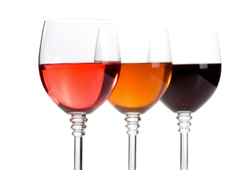 wine in glasses isolated on white