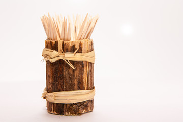 Wooden toothpicks on a white background