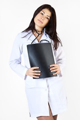 Woman doctor with a white board on a white background.