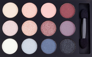 Make-up, colorful eye shadows palette, background